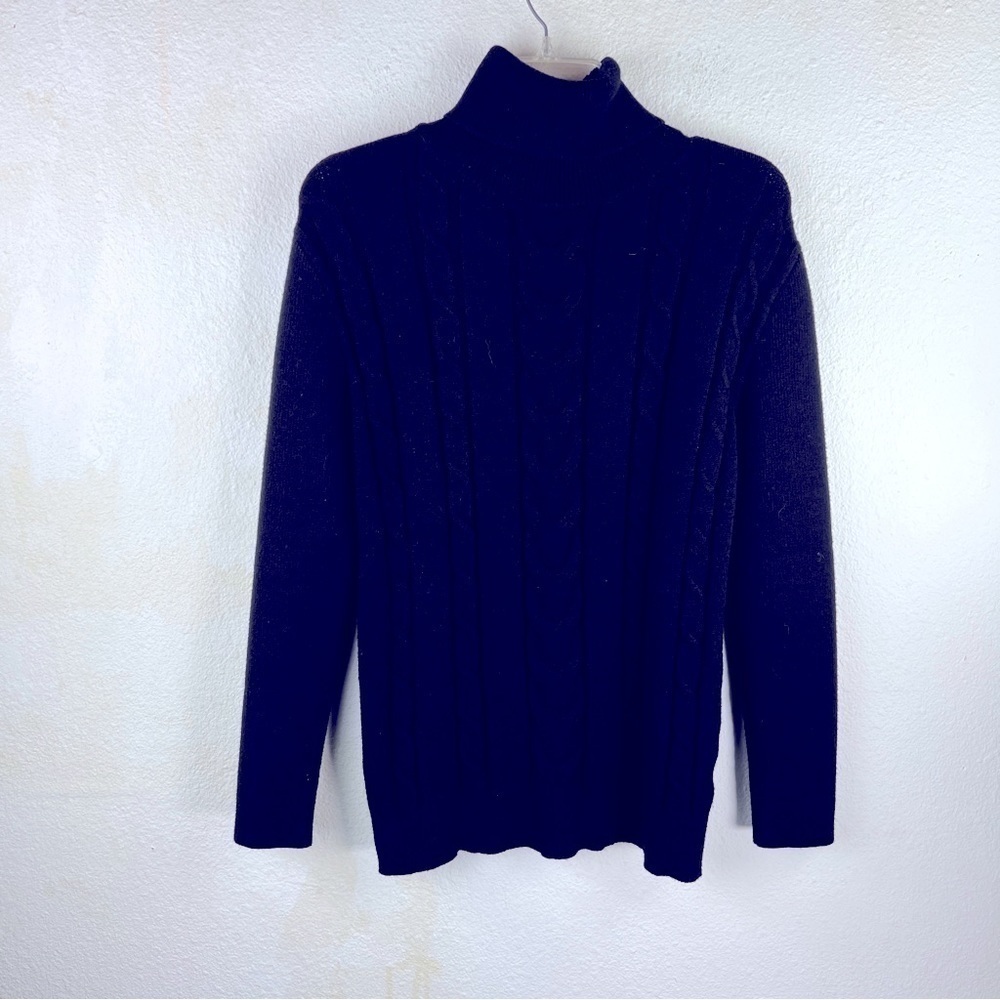 TURTLENECK SWEATER. Black knit with cables. No brand, imported. Size Medium.